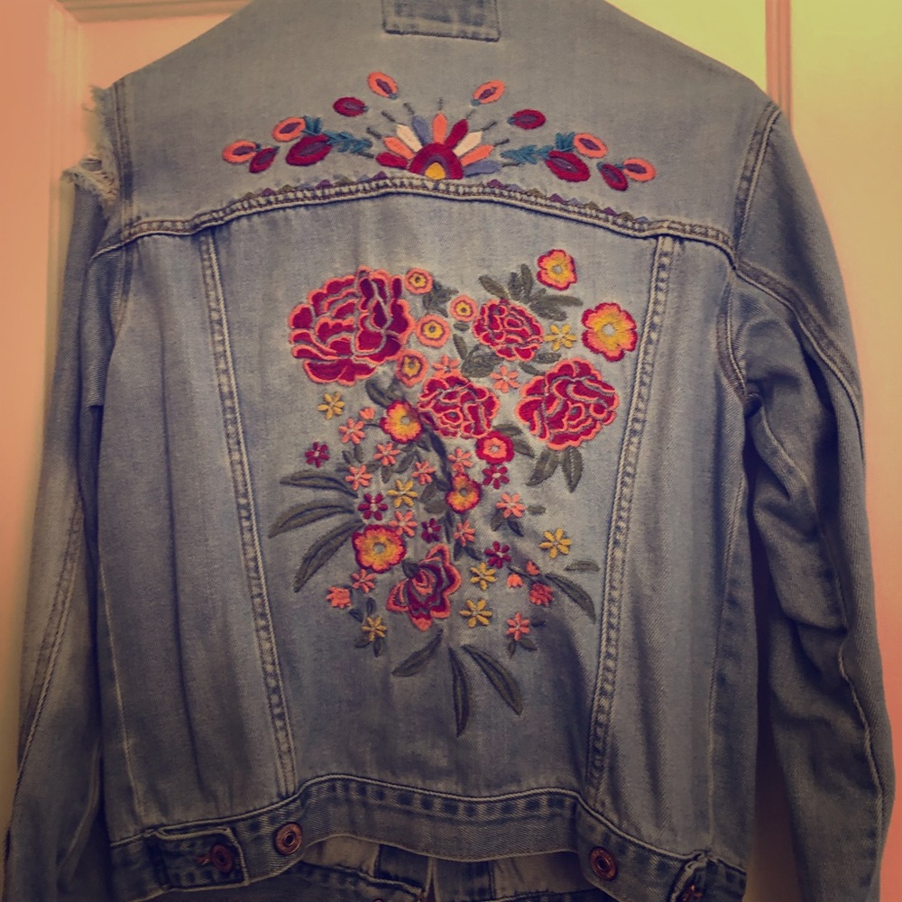 Light washed denim jacket with flower design